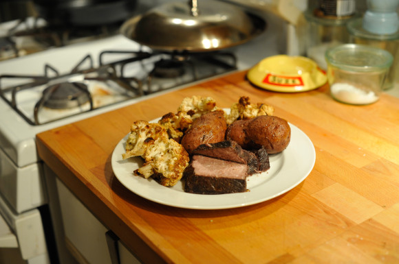 Pot roast potatoes and roasted cauliflower