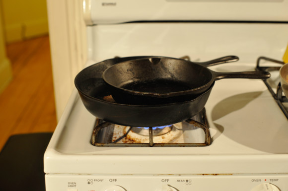 Chicken between pans