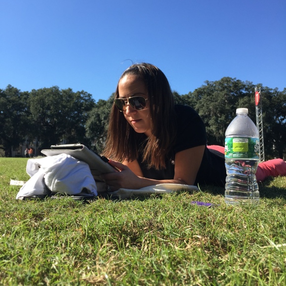 Rebecca reading in Forsyth Park