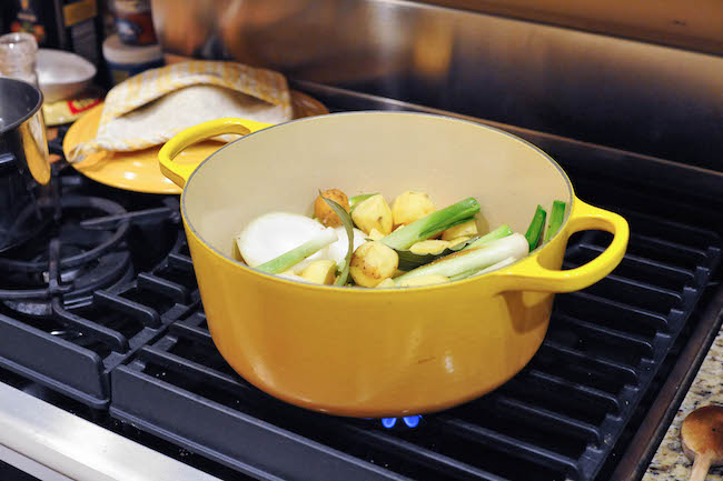 Cooking a pot of potato leek soup in a Le Creuset