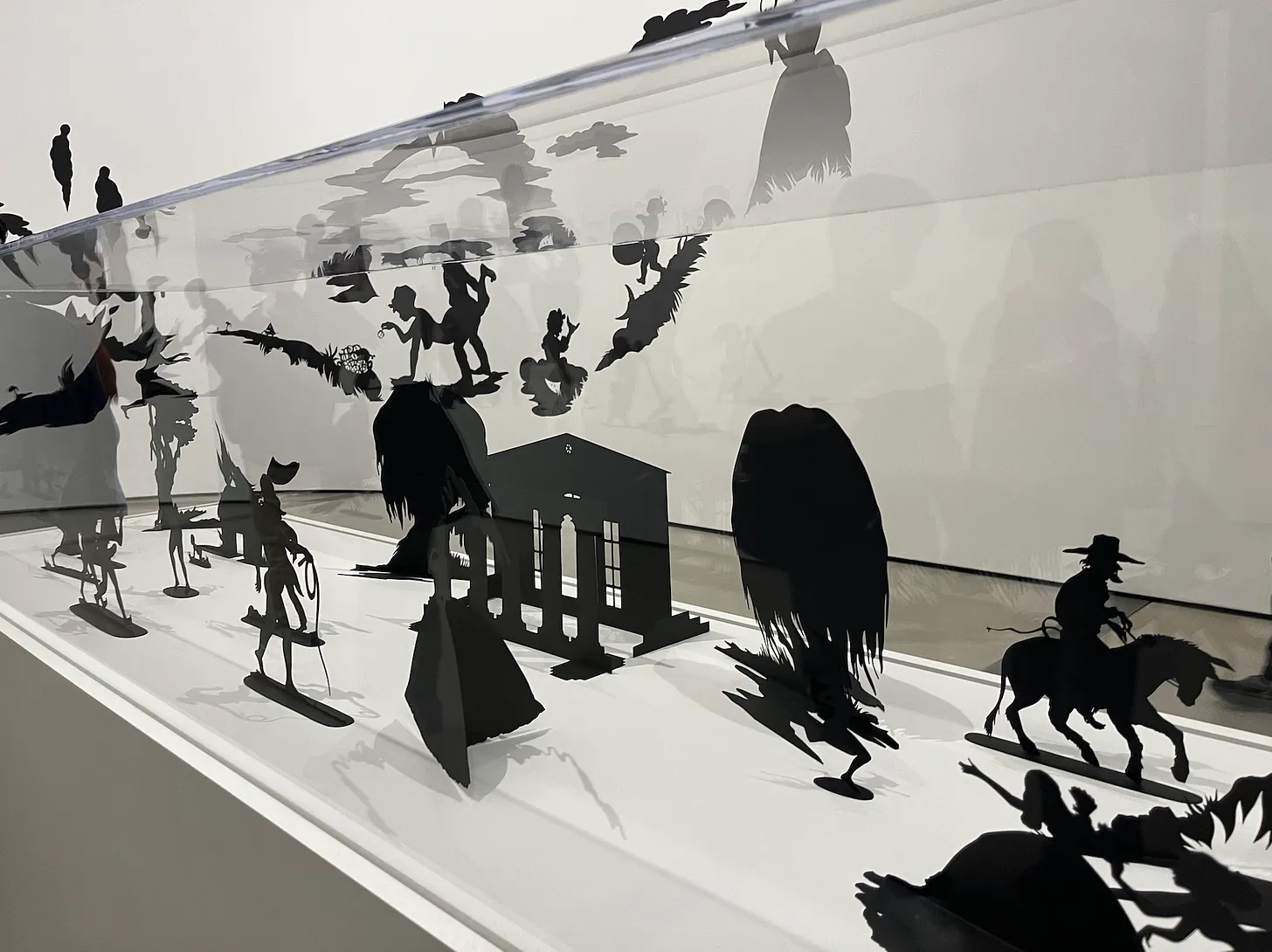 paper cut paper silhouettes by the artist kara walker (NSFW)